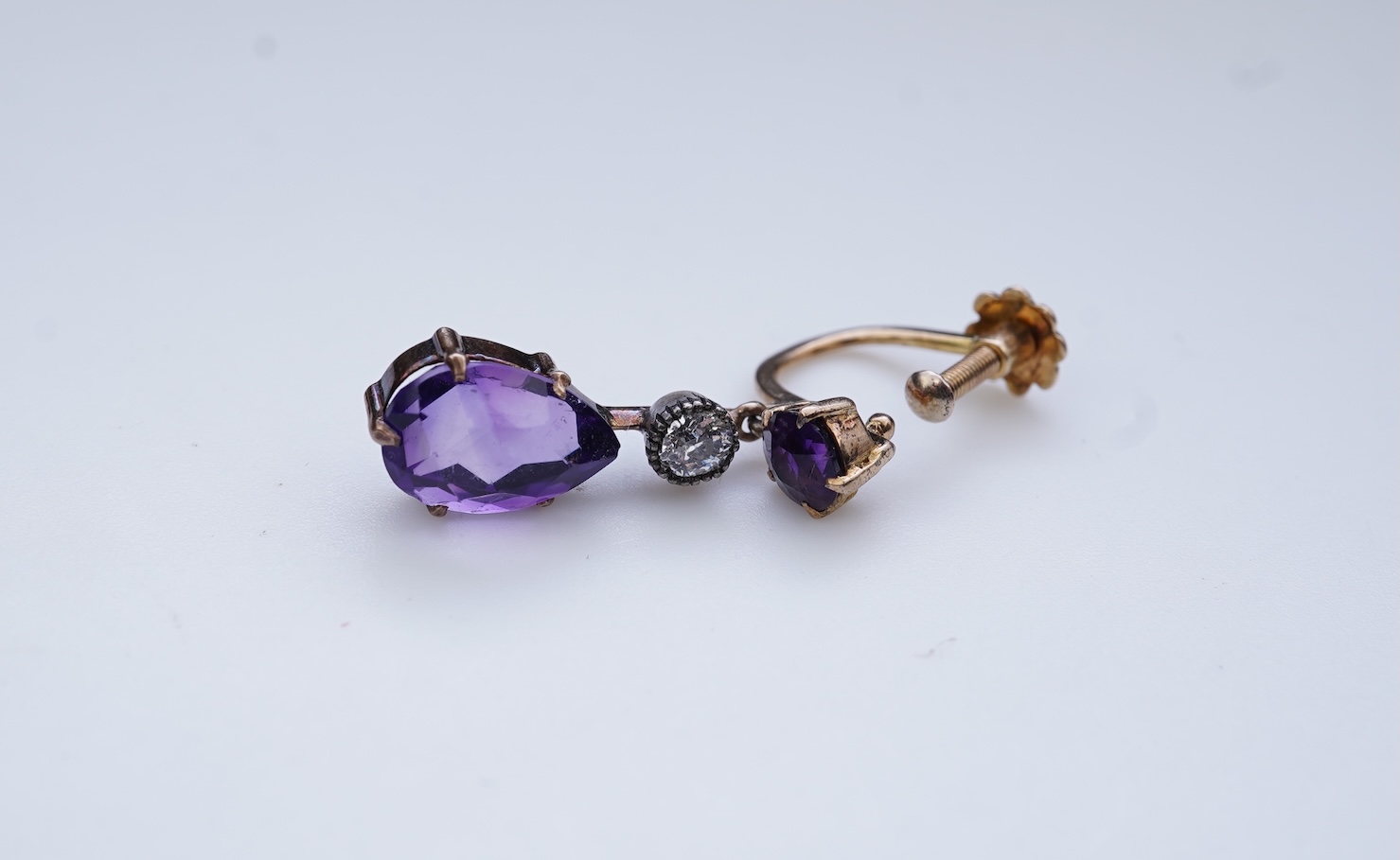 A pair of amethyst and diamond earrings, early 20th century